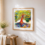 Colourful tree with deep roots cross stitch artwork displayed on wall as home decor