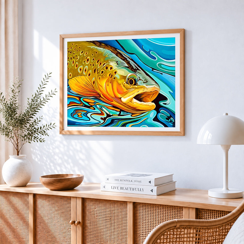 Colourful trout fish cross stitch artwork displayed on wall as home decor
