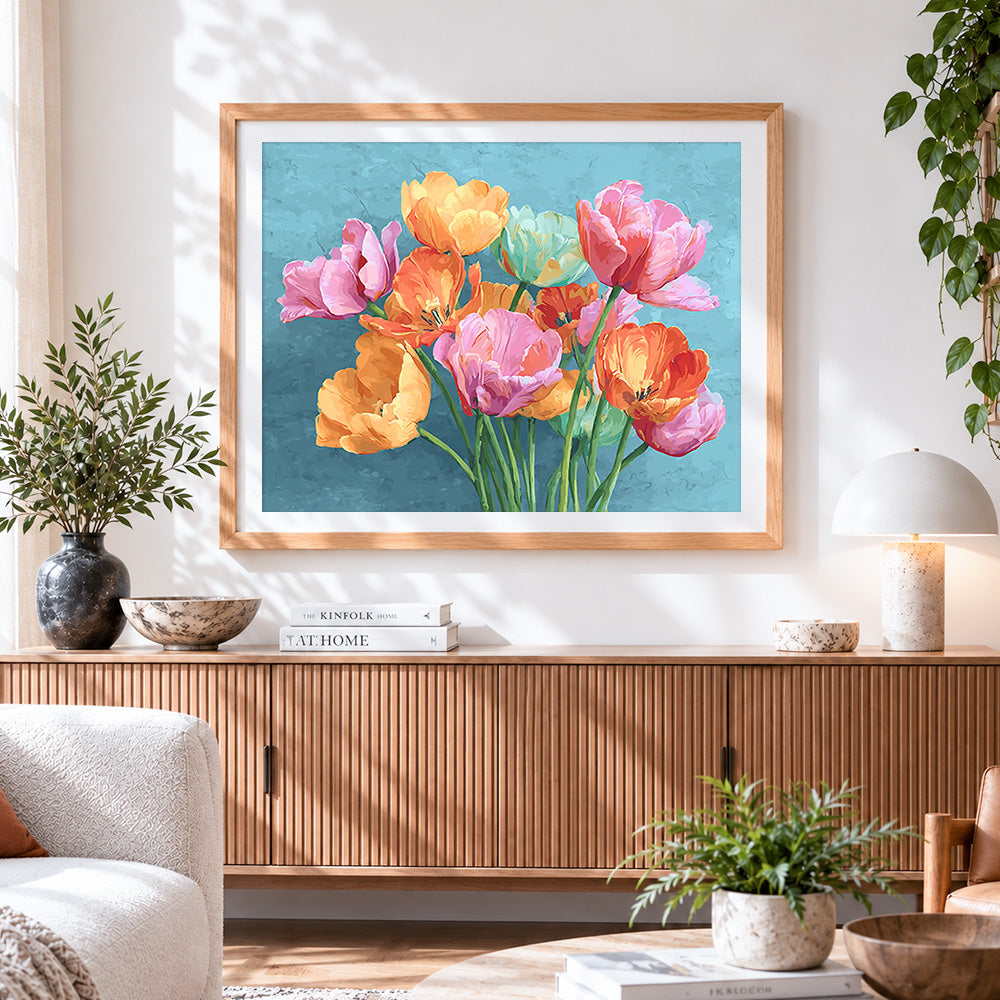 Finished colourful tulips on a teal background cross stitch artwork displayed