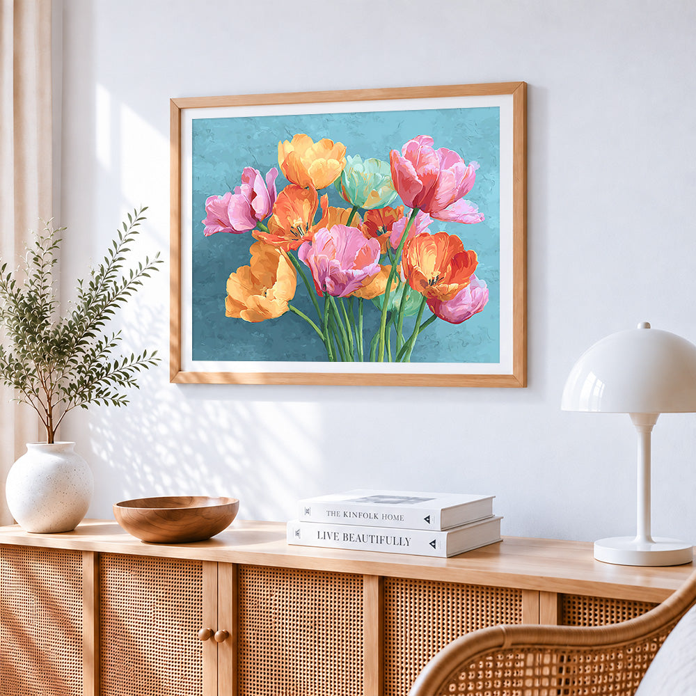 Colourful tulips on a teal background cross stitch artwork displayed on wall as home decor
