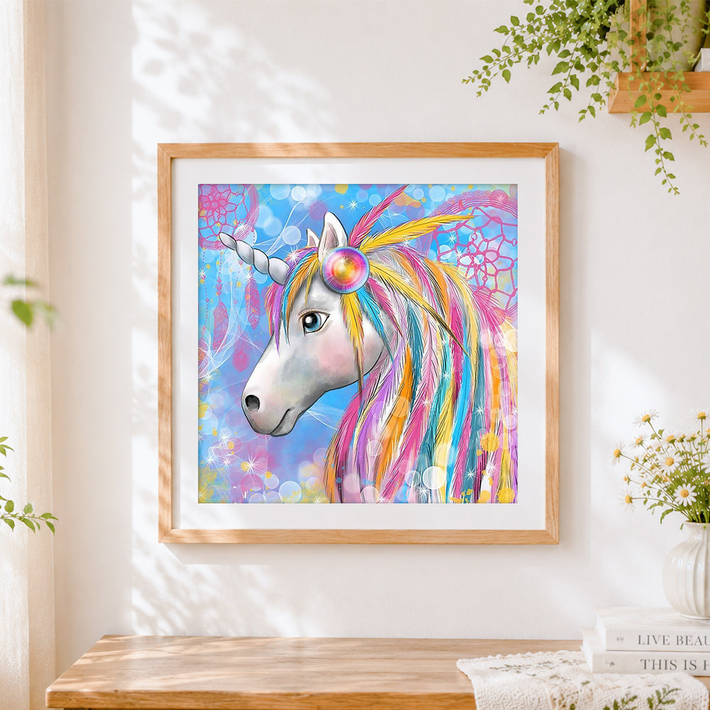 Finished colourful unicorn with dreamcatcher cross stitch artwork displayed