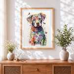 Finished colourful watercolour floral puppy cross stitch artwork displayed