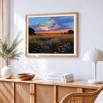 Colourful wildflower meadow at sunset cross stitch artwork displayed on wall as home decor