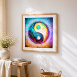 Colourful yin yang symbol cross stitch artwork displayed on wall as home decor