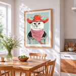 Cool cat in a cowboy hat and bandana cross stitch artwork displayed on wall as home decor