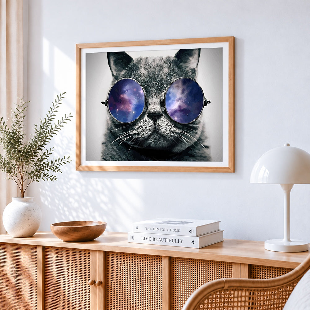 Cool cat wearing galaxy sunglasses cross stitch artwork displayed on wall as home decor