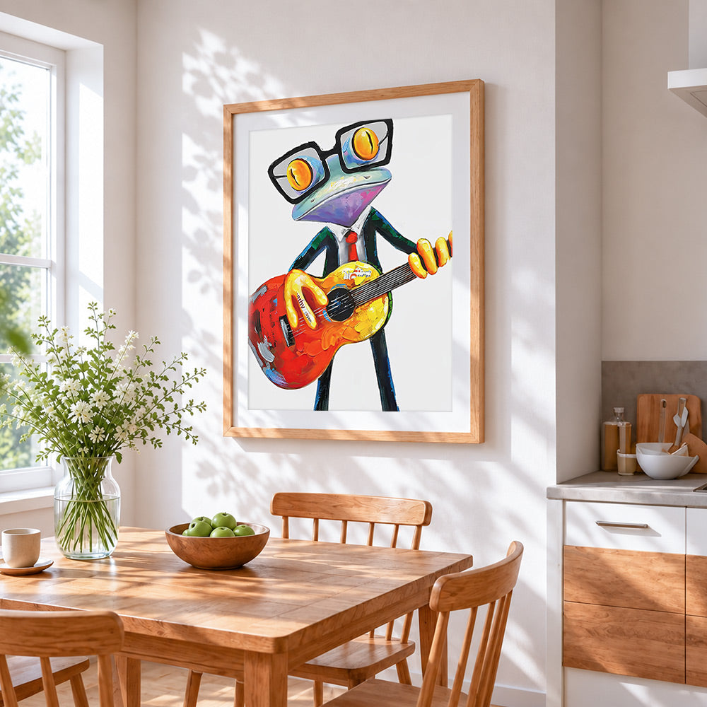 Cool frog playing guitar cross stitch artwork displayed on wall as home decor