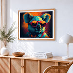 Cool koala with sunglasses and bow tie cross stitch artwork displayed on wall as home decor