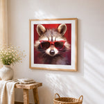 Cool raccoon with red sunglasses cross stitch artwork displayed on wall as home decor