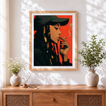 Finished cool woman with braids and cap cross stitch artwork displayed