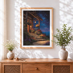 Finished cosy cabin under starry sky cross stitch artwork displayed