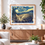 Finished cosy cat sleeping under a starry night cross stitch artwork displayed