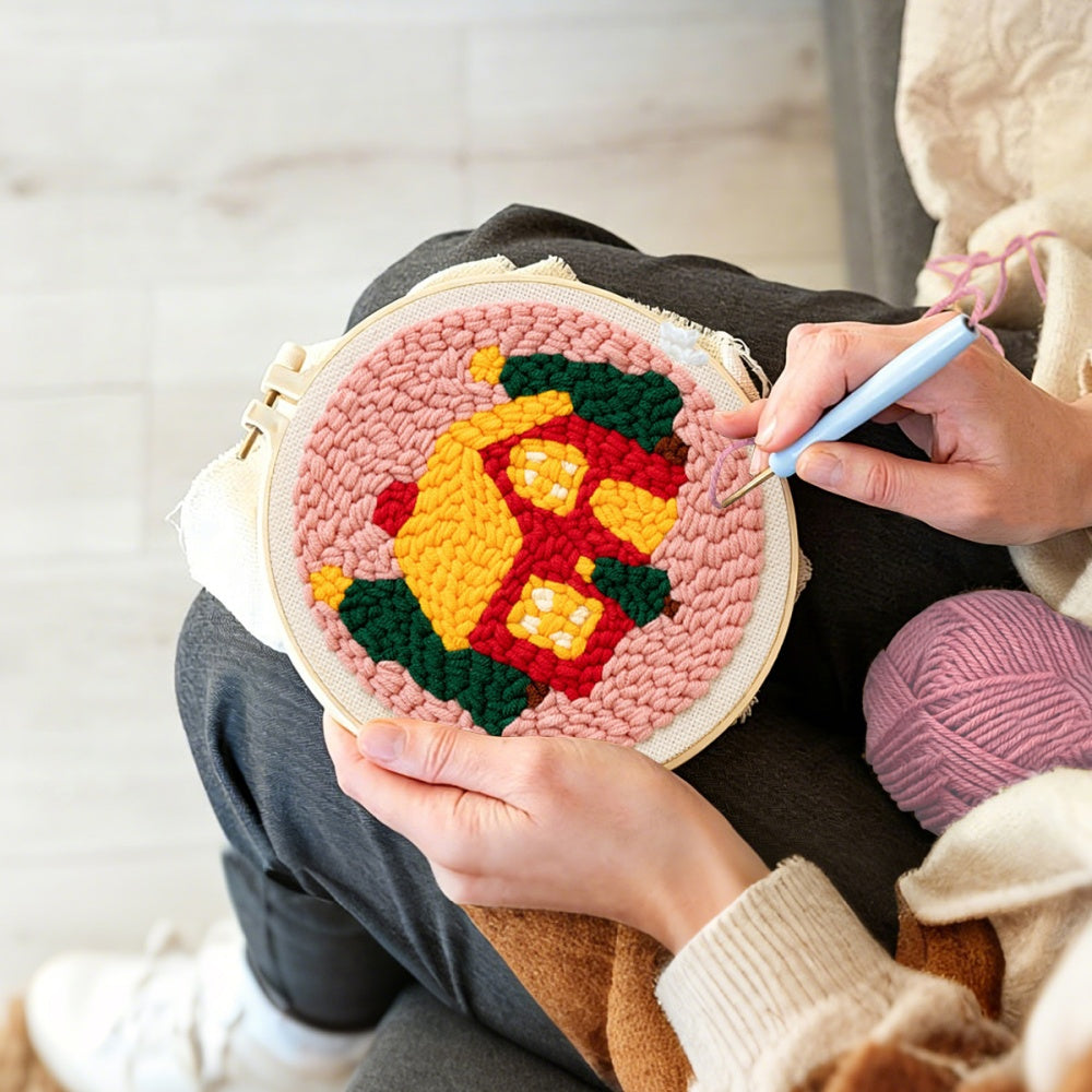 Creating handmade cosy christmas cabin unch needle artwork