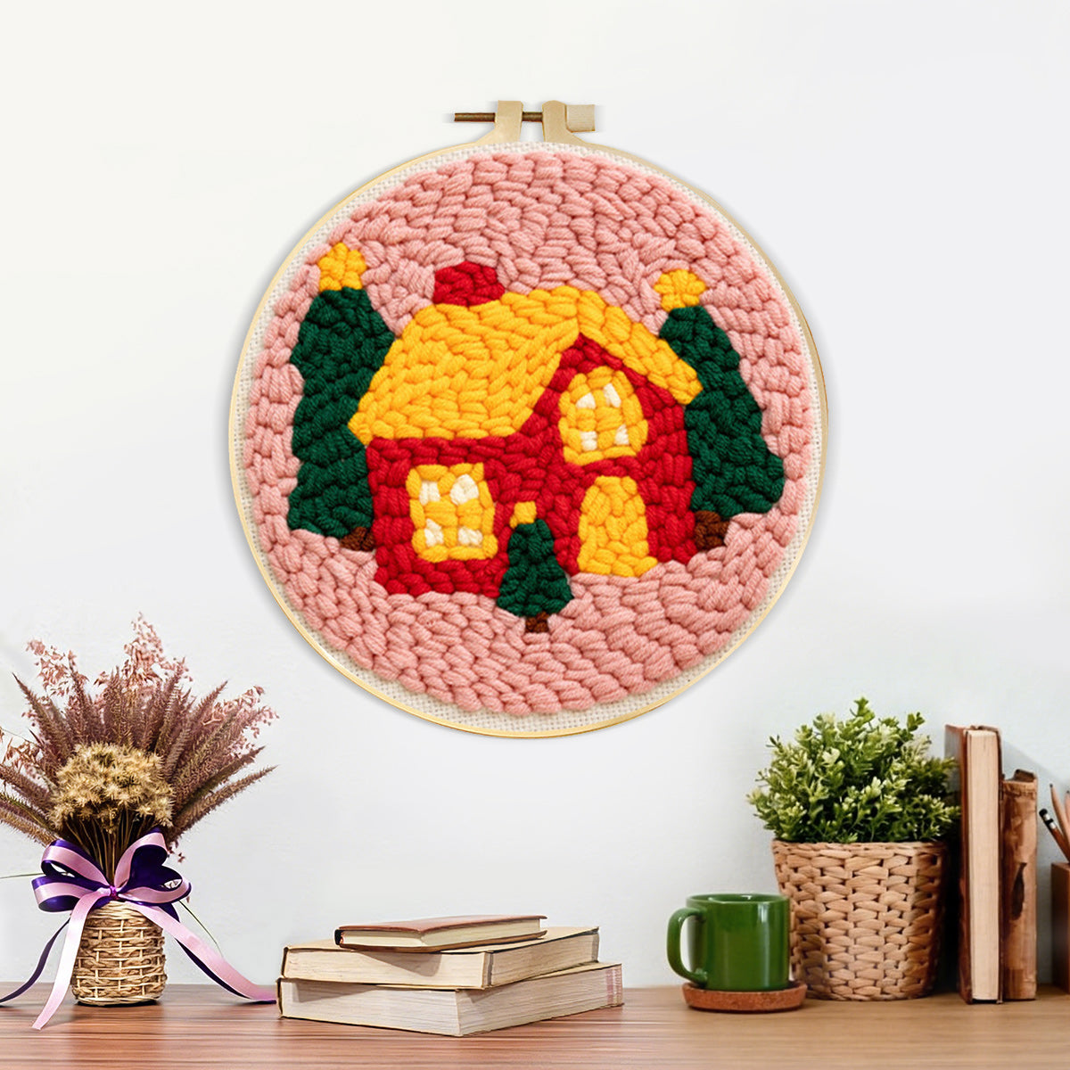 Finished cosy christmas cabin artwork displayed on a wall