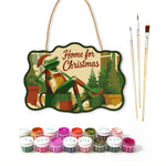 Cosy christmas retreat paint by numbers door hanger with paints and brushes