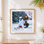 Finished cosy christmas snowman, child and gifts cross stitch artwork displayed