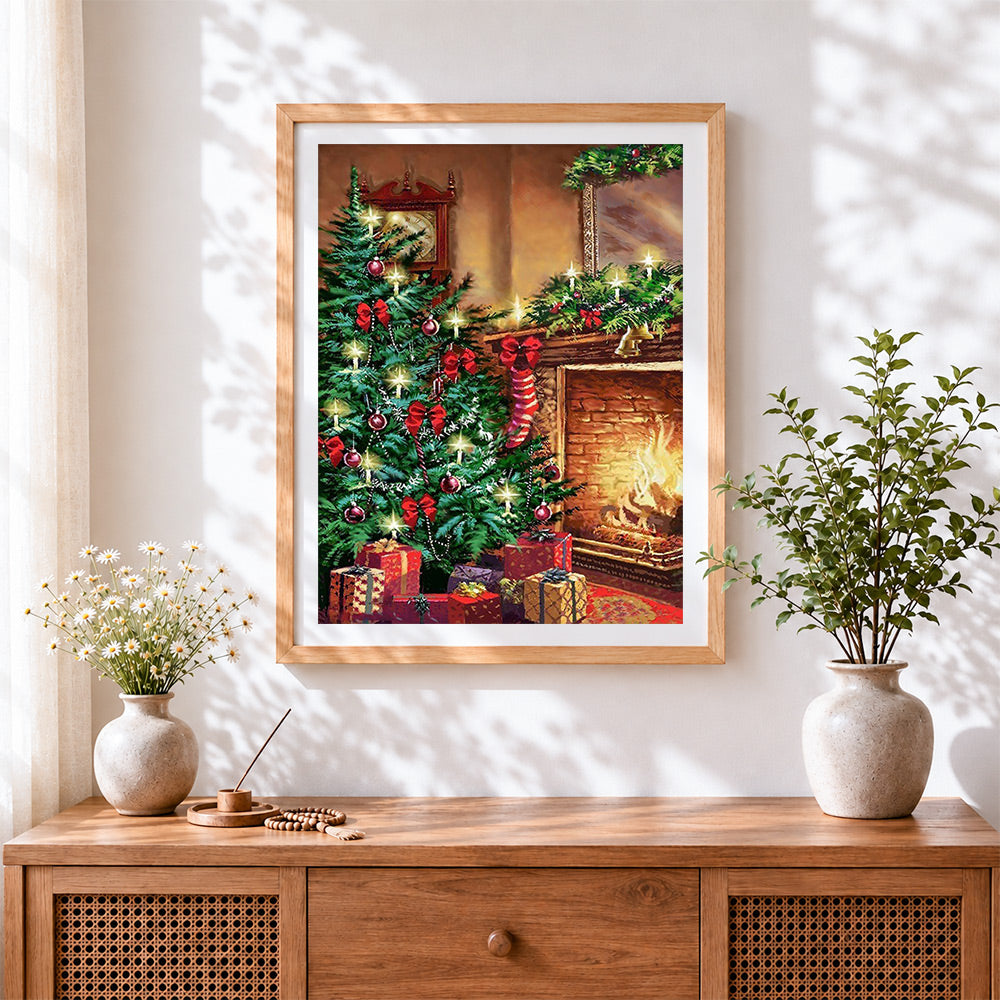 Finished cosy christmas tree and fireplace cross stitch artwork displayed