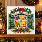 Finished cosy christmas window scene pearl diamond painting artwork displayed as holiday home decor