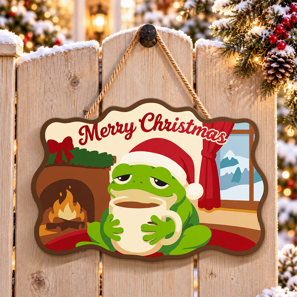 Cosy frog holiday paint by numbers door hanger on a garden gate