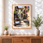 Finished cosy italian cafe courtyard cross stitch artwork displayed