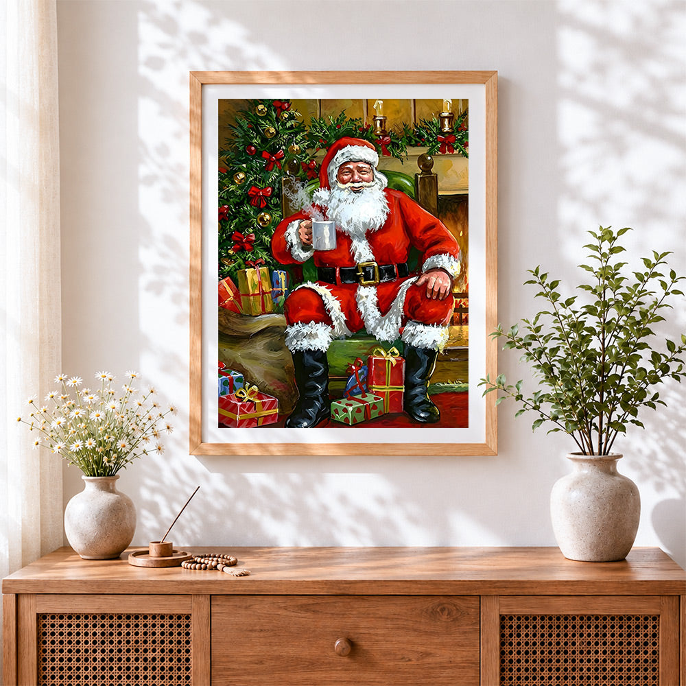 Finished cosy santa by the fireplace cross stitch artwork displayed