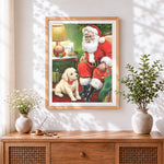 Finished cosy santa with puppy cross stitch artwork displayed