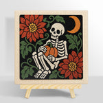 Cosy skeleton holding pumpkin punch needle kit for beginners