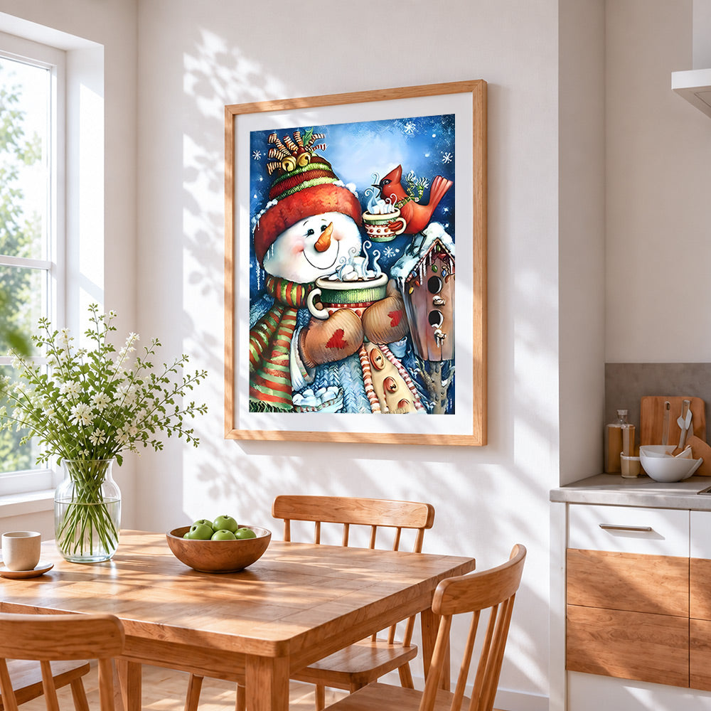 Cosy snowman drinking hot cocoa cross stitch artwork displayed on wall as home decor