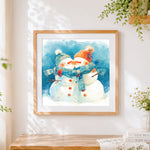 Finished cosy snowmen couple in love cross stitch artwork displayed