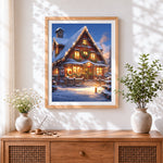 Finished cosy snowy christmas cottage cross stitch artwork displayed