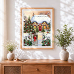 Finished cosy snowy cottage with christmas trees cross stitch artwork displayed