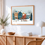 Cosy snowy village and snowman paint by numbers artwork displayed on wall as home decor