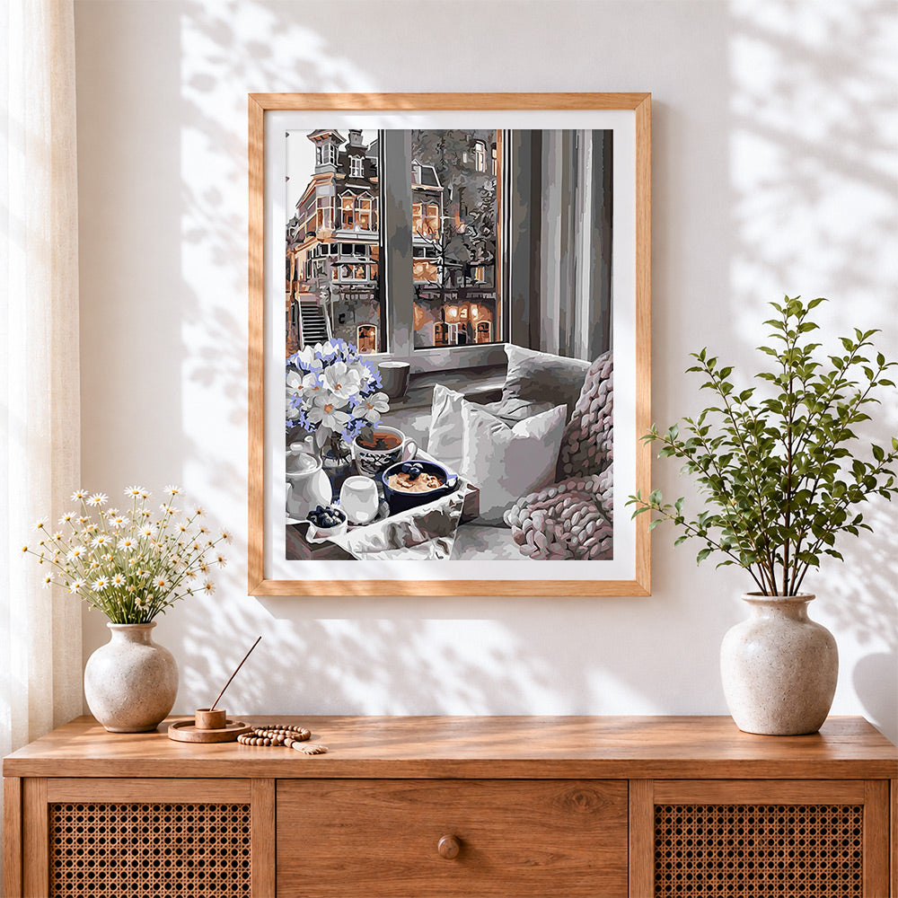 Finished cosy window breakfast cross stitch artwork displayed