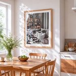 Cosy window breakfast cross stitch artwork displayed on wall as home decor