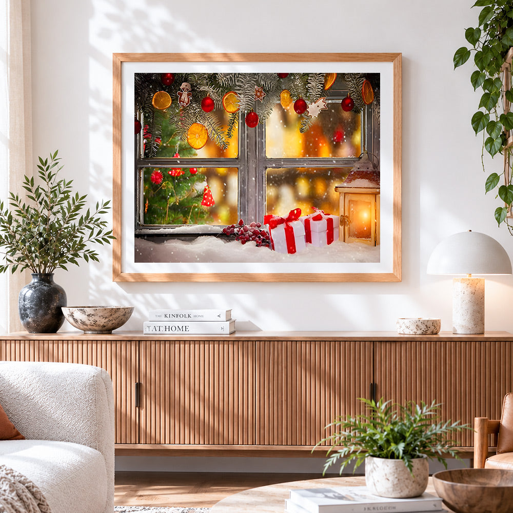 Finished cosy window with festive decorations cross stitch artwork displayed