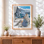Finished cosy winter window mountain view cross stitch artwork displayed