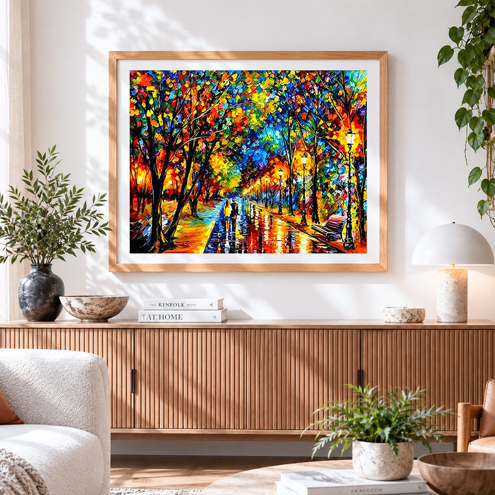 Finished couple walking in a colourful rainy park cross stitch artwork displayed