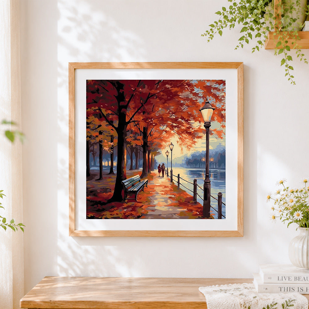 Finished couple walking in an autumn park cross stitch artwork displayed