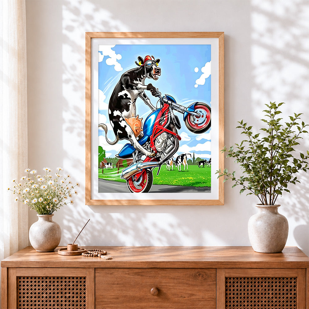 Finished cow riding a motorbike cross stitch artwork displayed