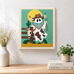 Finished cowboy ghost with lasso artwork displayed on a wall