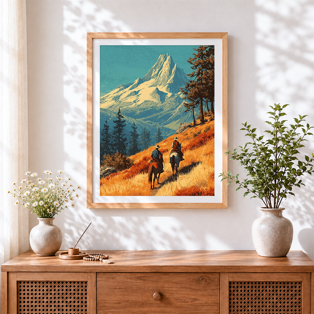 Finished cowboys riding towards snowy mountains cross stitch artwork displayed