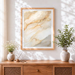 Finished cream and gold marble texture cross stitch artwork displayed