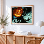 Creepy glowing jack-o-lantern in dark woods paint by numbers artwork displayed on wall as home decor