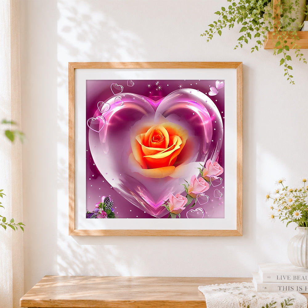 Finished crystal heart with orange rose cross stitch artwork displayed