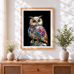 Finished crystal jewelled owl cross stitch artwork displayed