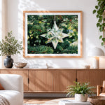 Finished crystal star christmas ornament cross stitch artwork displayed