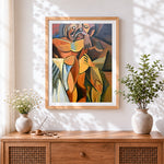 Finished cubist embrace cross stitch artwork displayed