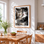 Cuddling sleeping kittens cross stitch artwork displayed on wall as home decor