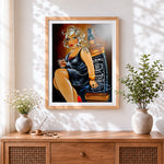 Finished curvy blonde woman with whiskey cross stitch artwork displayed