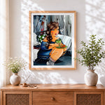 Finished curvy woman drinking tea cross stitch artwork displayed